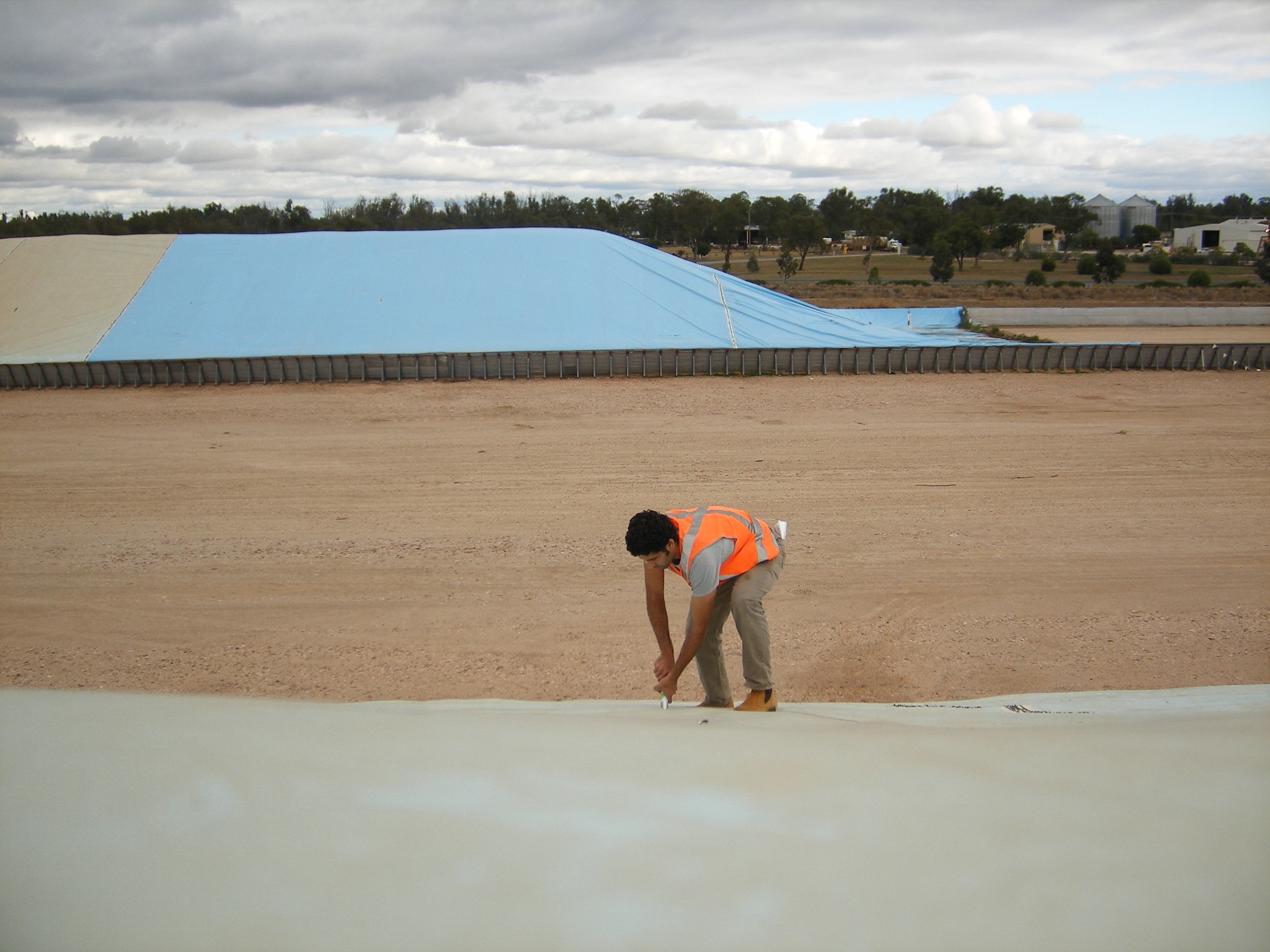 Dr David Elmouttie taking grains samples