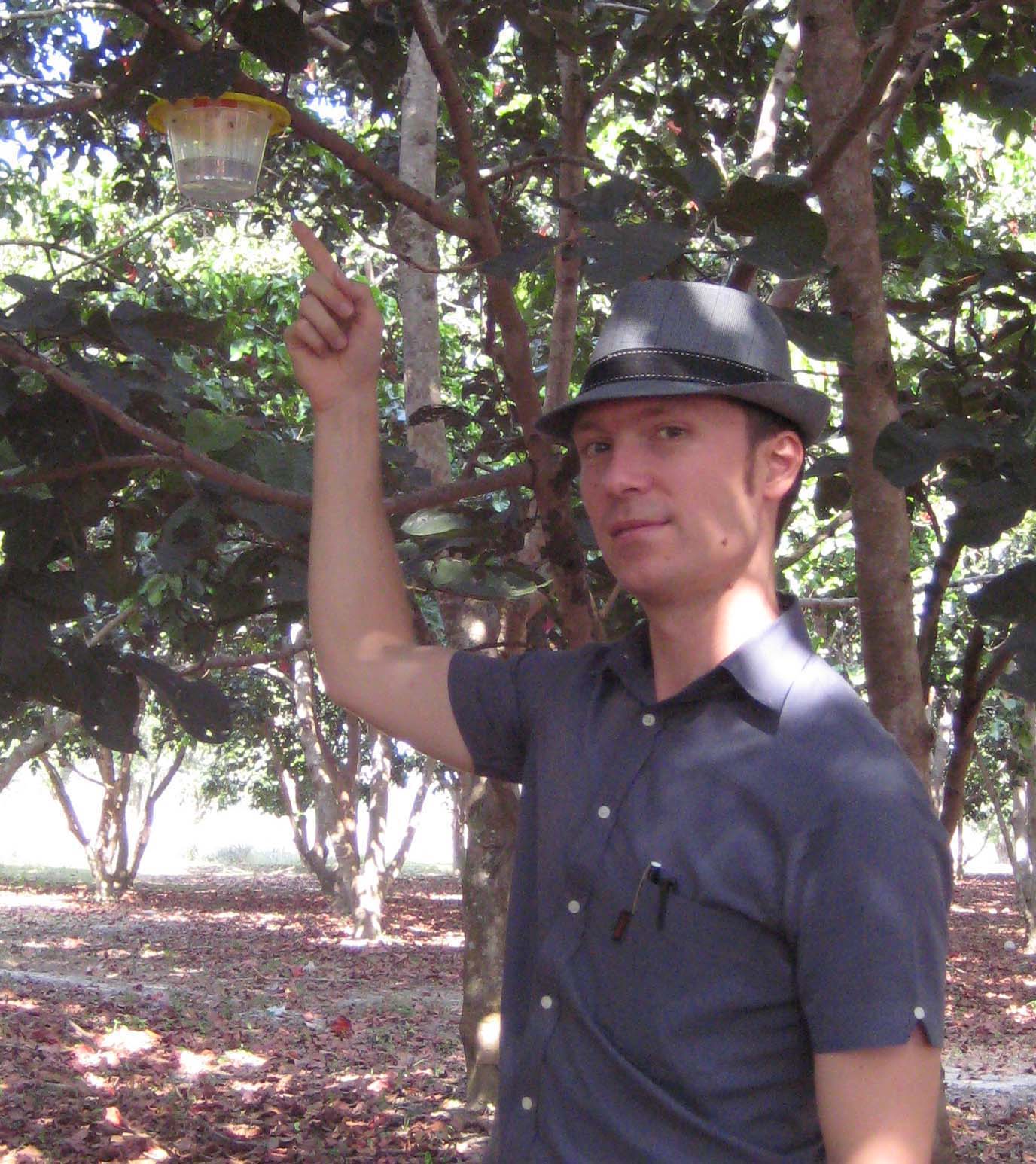 Dr Mark Schutze with one of his fruit fly traps  